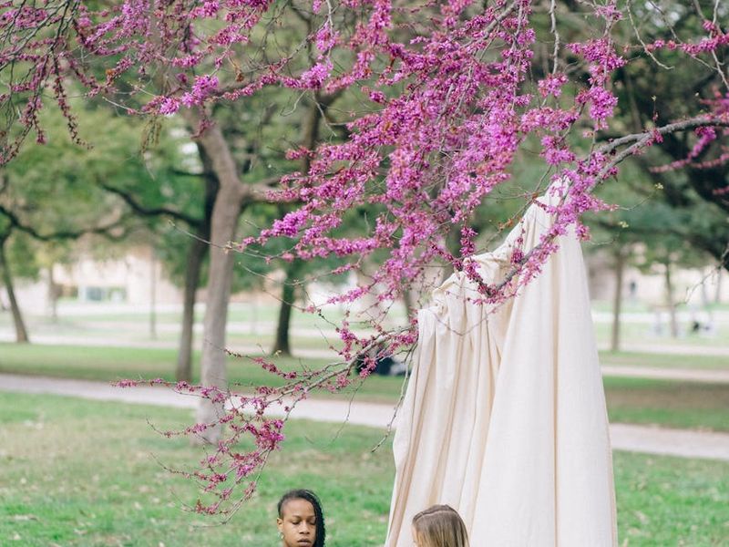 A person transitioning smoothly between two yoga poses on a mat.